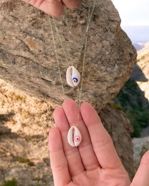 Cowrie & Eye Pendant — fine 18k gold, Sierra Jewelry Freetown